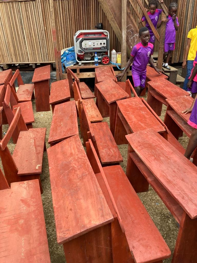 New wooden school desks built for children in Makoko